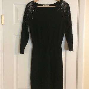 Beautiful fitted sweater dress with sequin detail